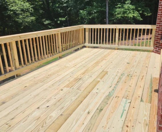 deck with wooden railing